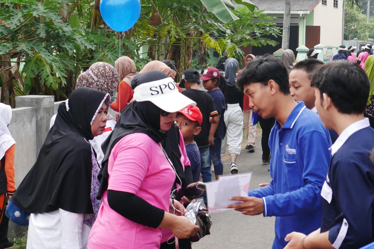 BI SOSIALISASIKAN QRIS SAAT MOMENTUM JALAN SEHAT BARENG HCM